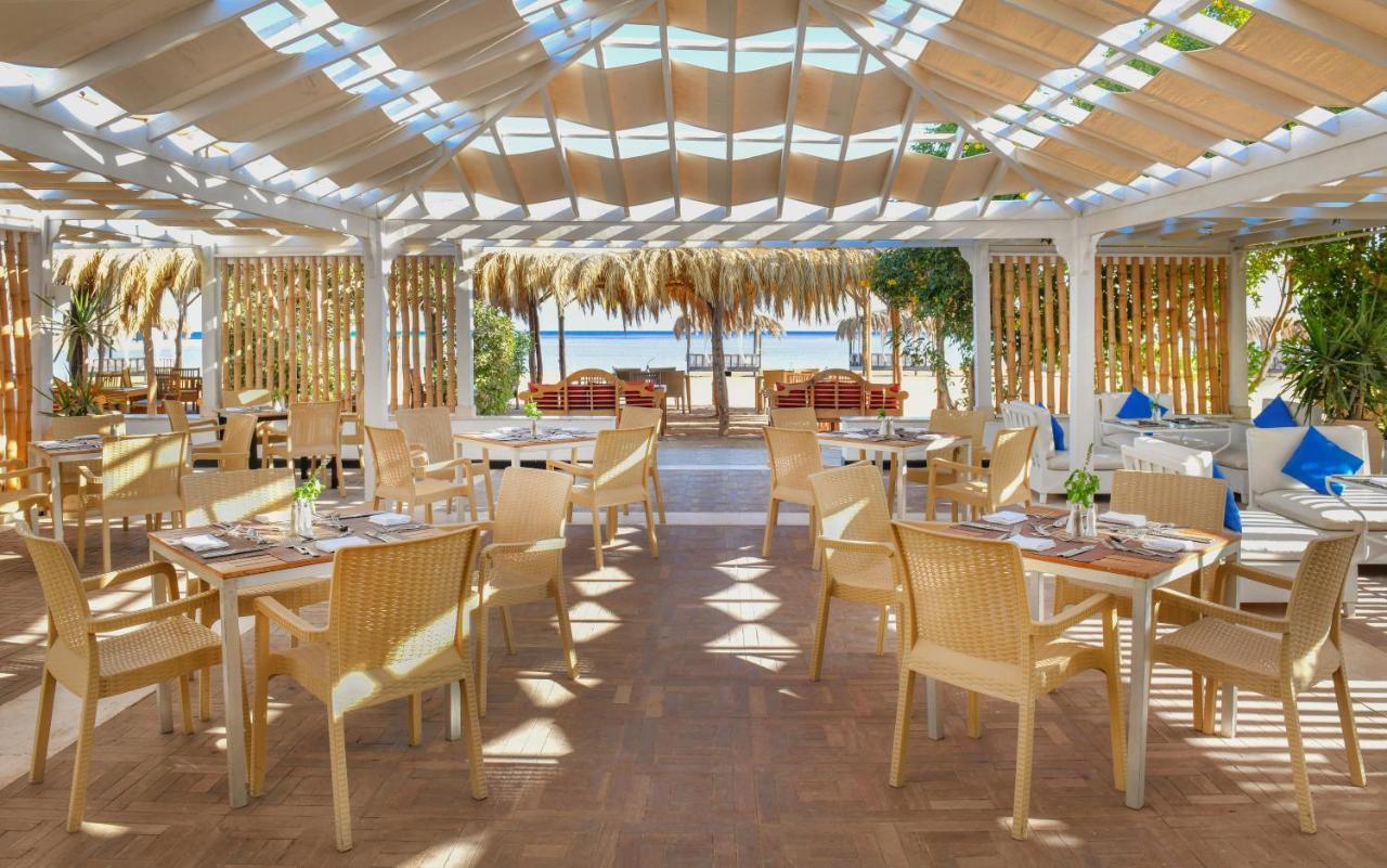Jaz Aquamarine Hotel Hurghada Exterior photo The restaurant at the beach